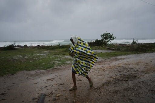 Hurricane Melissa weakens as it churns across Cuba as a Category 2 storm